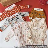 Magnetic baby sleepsuit 6-9M, Leafy design
